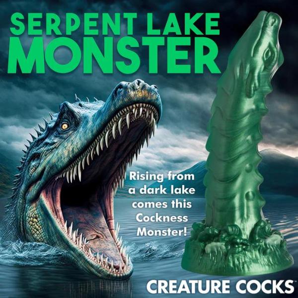 Plongez dans le Monde Envoûtant du gode Cockness Monster Le gode Cockness Monster est un chef-d'œuvre iridescent en forme de dragon.
