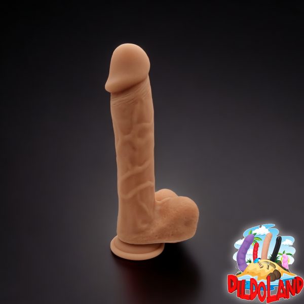 Découvrez Bad Boy de DildoLand : un gode en silicone liquide, doux et compatible avec harnais. Plaisir sans limites!"