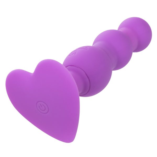 Sonde Anale à Triple Billes Vibrante tenue dans la main pour une perspective de taille.