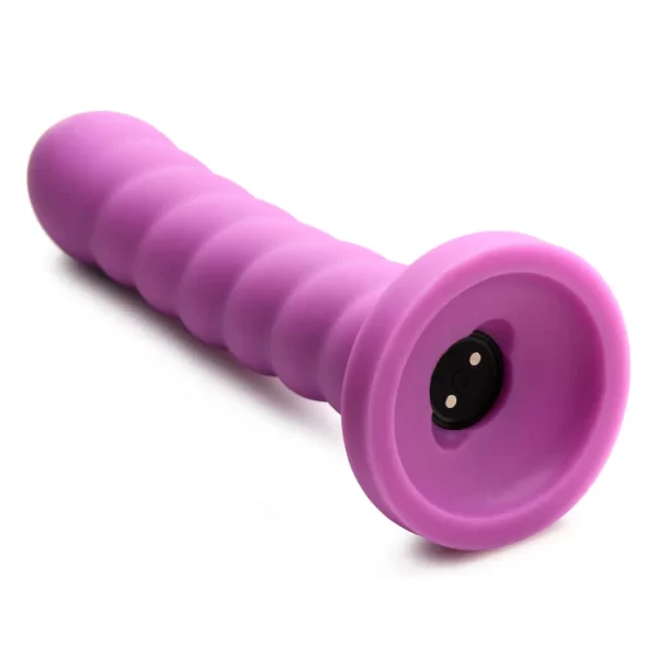 Comparaison de taille du vibromasseur avec ses 7,5 pouces de longueur.