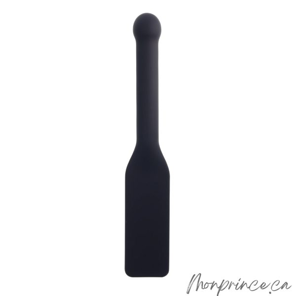 Accessoire BDSM Edge® exposé dans un cadre raffiné.