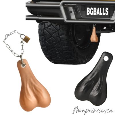 Big Truck Nuts beige en forme de testicules fixés à une remorque.