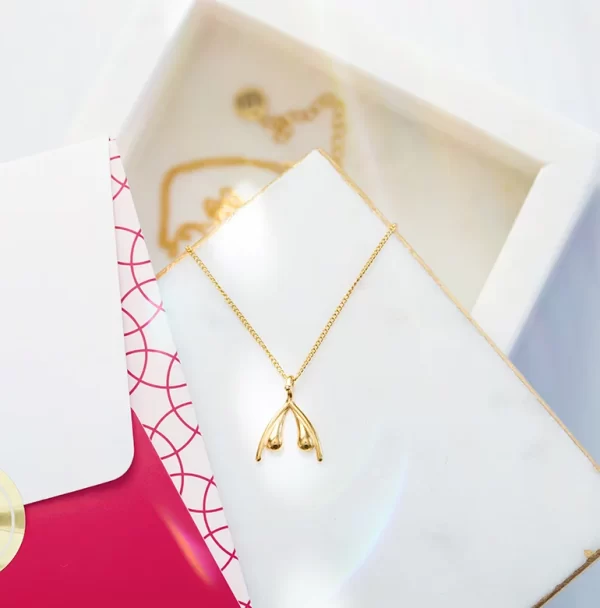 Collier Clitoris Doré – Symbole de Plaisir et de Fierté