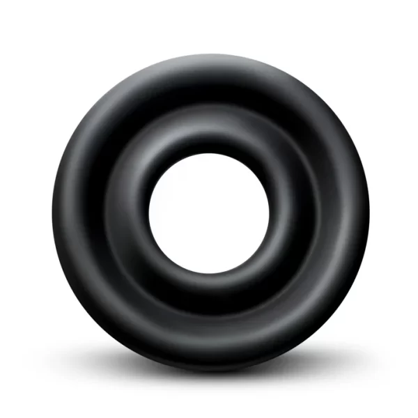 « Manchon en Silicone de Pompe Pénis Performance Medium, couleur noire, sur fond blanc »