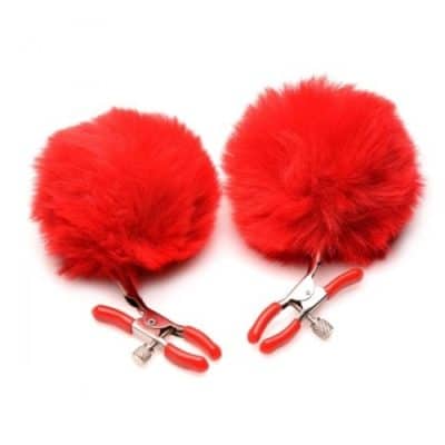 « Pinces à mamelons Charmed Pom Pom, vue complète, design rouge et ludique »