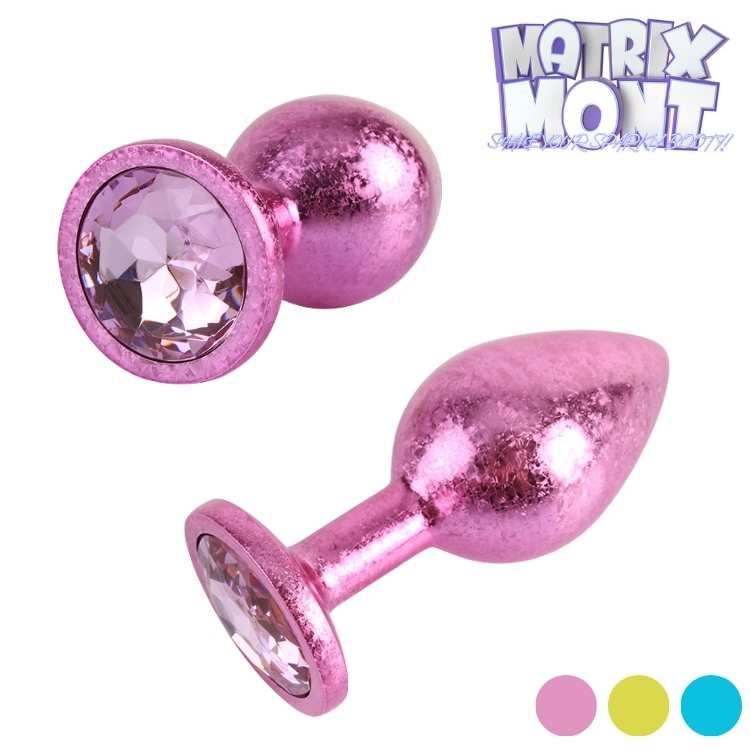 Collection Matrix Mont Nebula Gem – trois plugs métalliques colorés bleu, or et rose avec cristaux décoratifs et finition miroir.