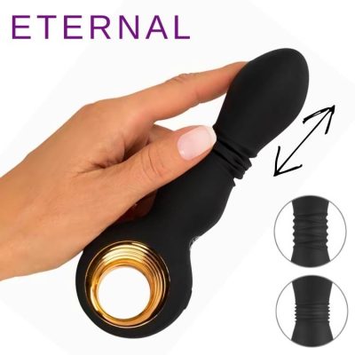 Le Strong Thrusting Vibrator ETERNAL noir avec la poignée en anneau et le mouvement de poussée illustré.