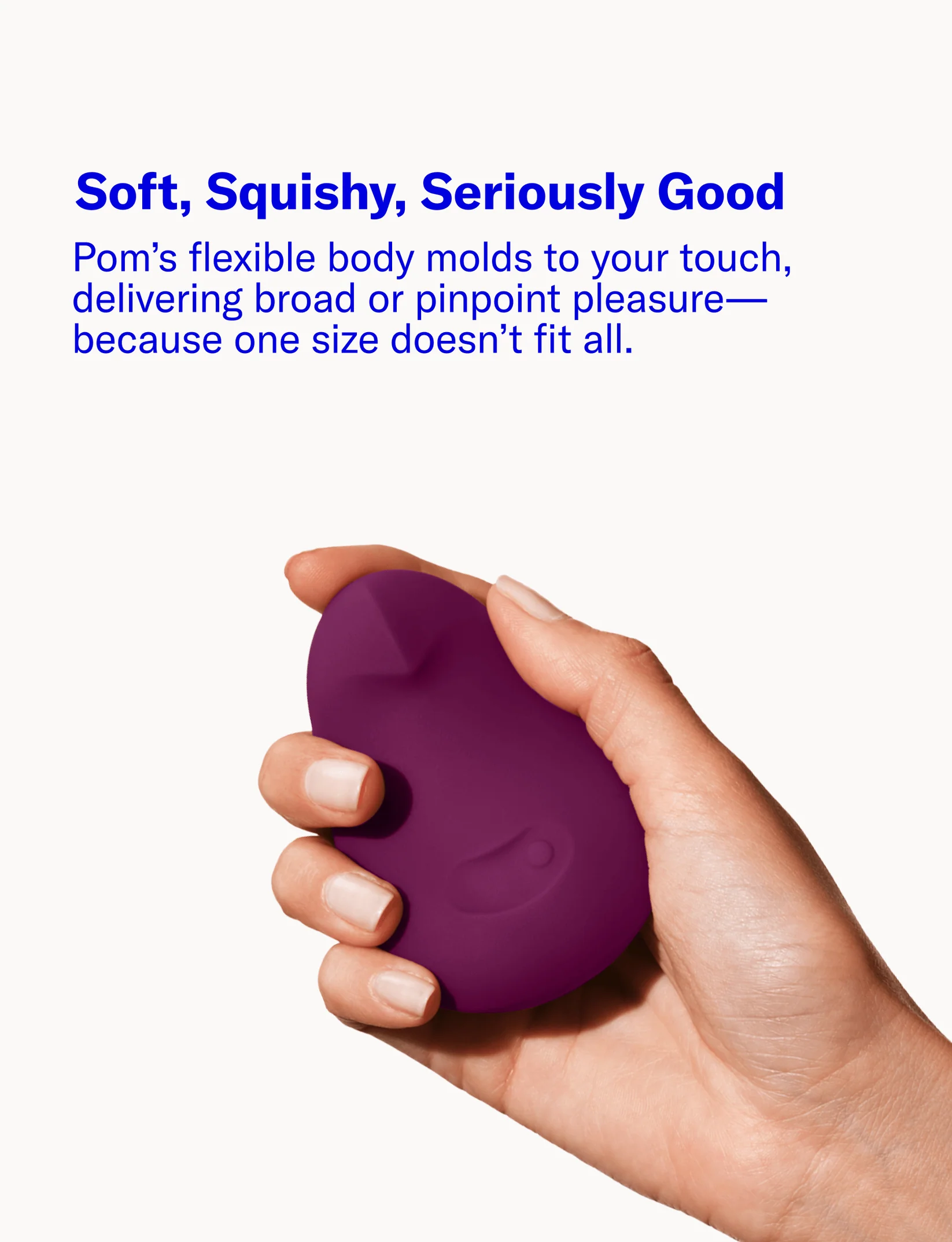 Vibromasseur de paume Pom tenue en main