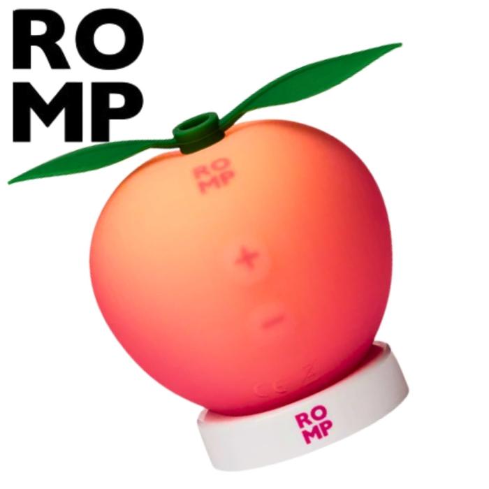ROMP Pink Peach stimulateur clitoridien air pulse rose discret paume en main