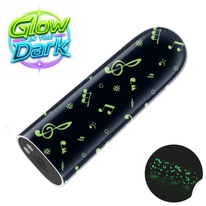 Motifs musicaux verts lumineux du mini vibrateur Lovetoy dans le noir
